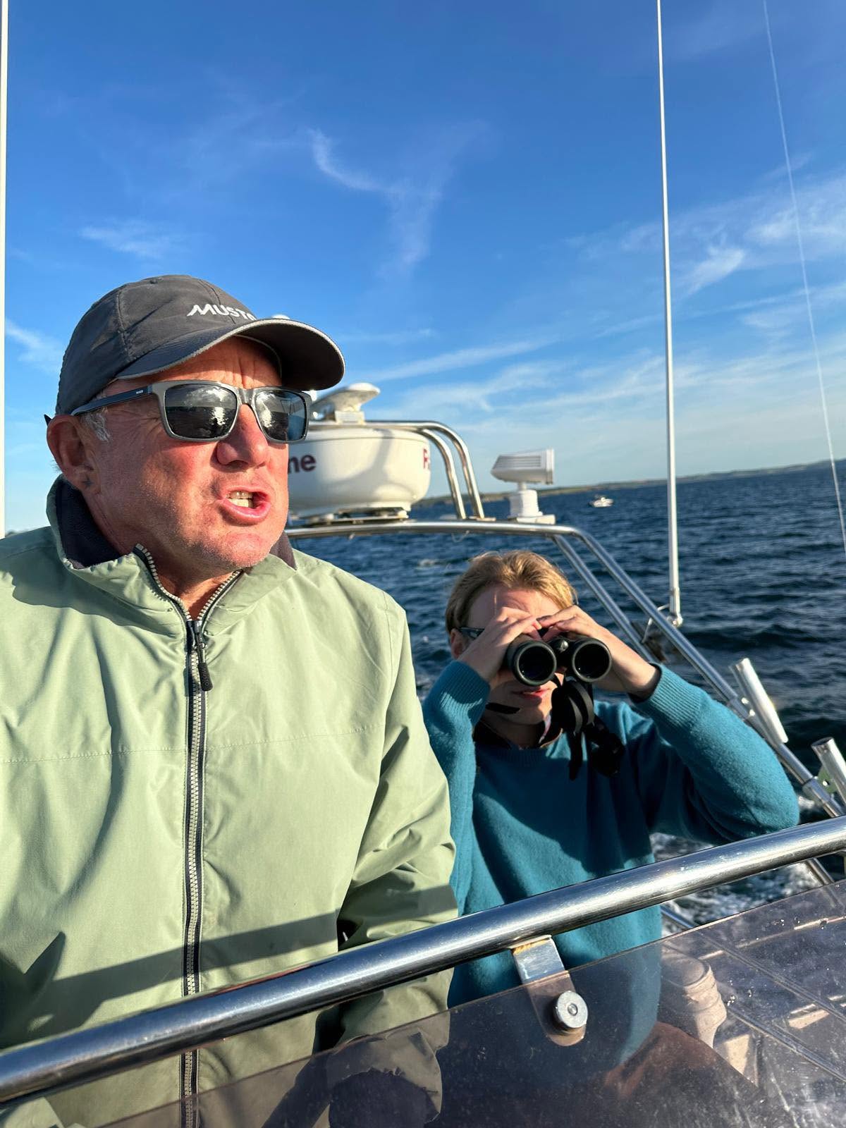 Jerry Rogers at the helm of Dreamcatcher, scanning the water for tuna